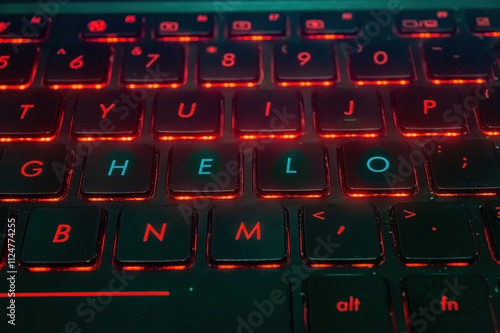 A close up of a backlit keyboard with red lighting, highlighting the keys G, H, E, L, and O in blue, spelling HELO. Ideal for tech and communication themes photo