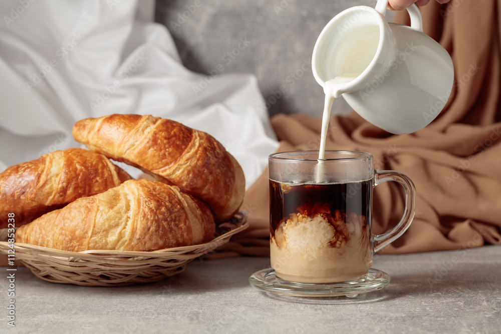 Croissants and coffee with cream. Croissants and coffee with cream.