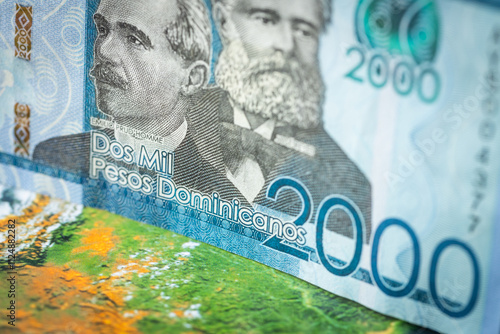 Obraz na płótnie Dominican Republic money, 2000 Dominican pesos banknote against the background of the world, financial market concept w salonie