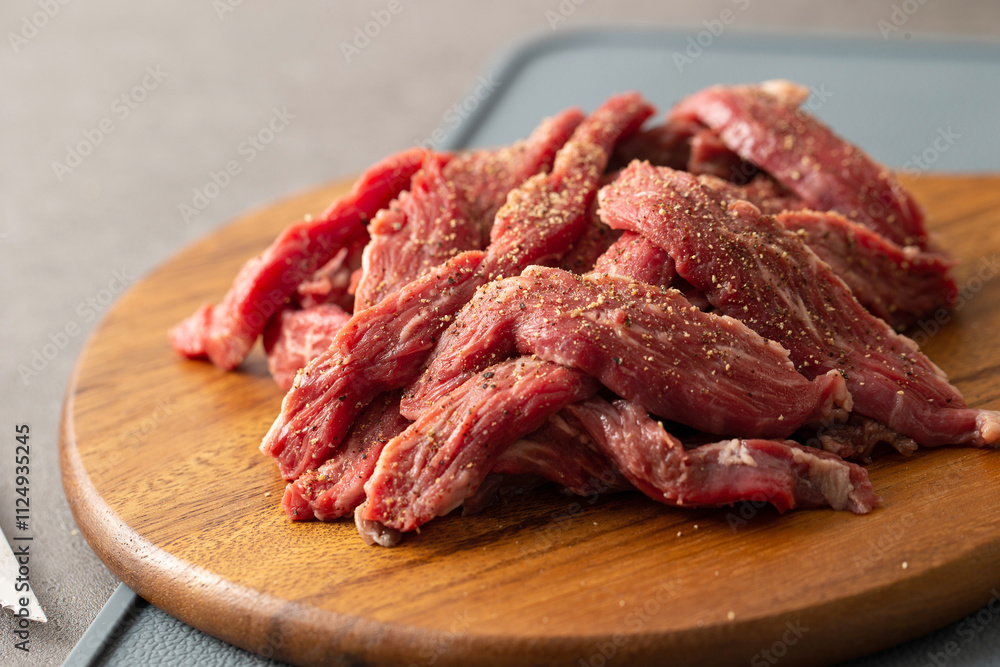 Raw meat on a cutting board Raw meat on a cutting board