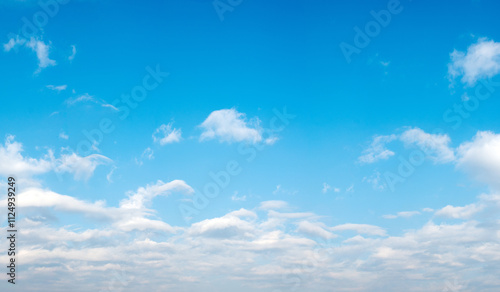 A simple sky with a few clouds