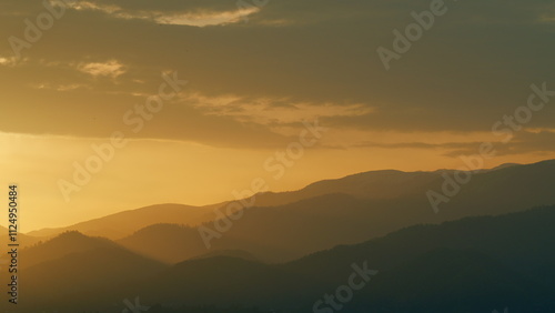 Wallpaper Mural Beautiful Golden Sunrise. Silhouette Of The Mountain Hills Against Sunrise Sky. Real time. Torontodigital.ca