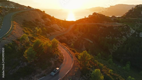 Aerial view of the picturesque Route de Crete near Cassis at sunset, France photo