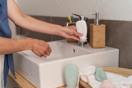 Refreshing hand-washing experience. girl washes her hands