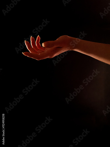 palm facing up, woman's hand