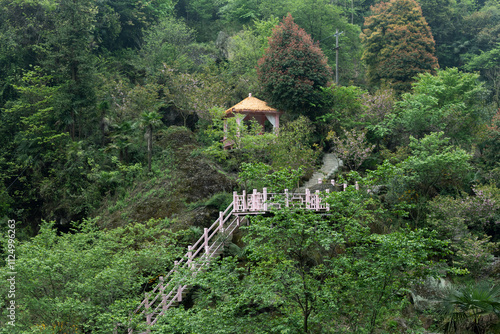 A pavilion on the hillside of the Cherry Blossom Valley in Yaojiagou, Pengzhou, Sichuan, China photo