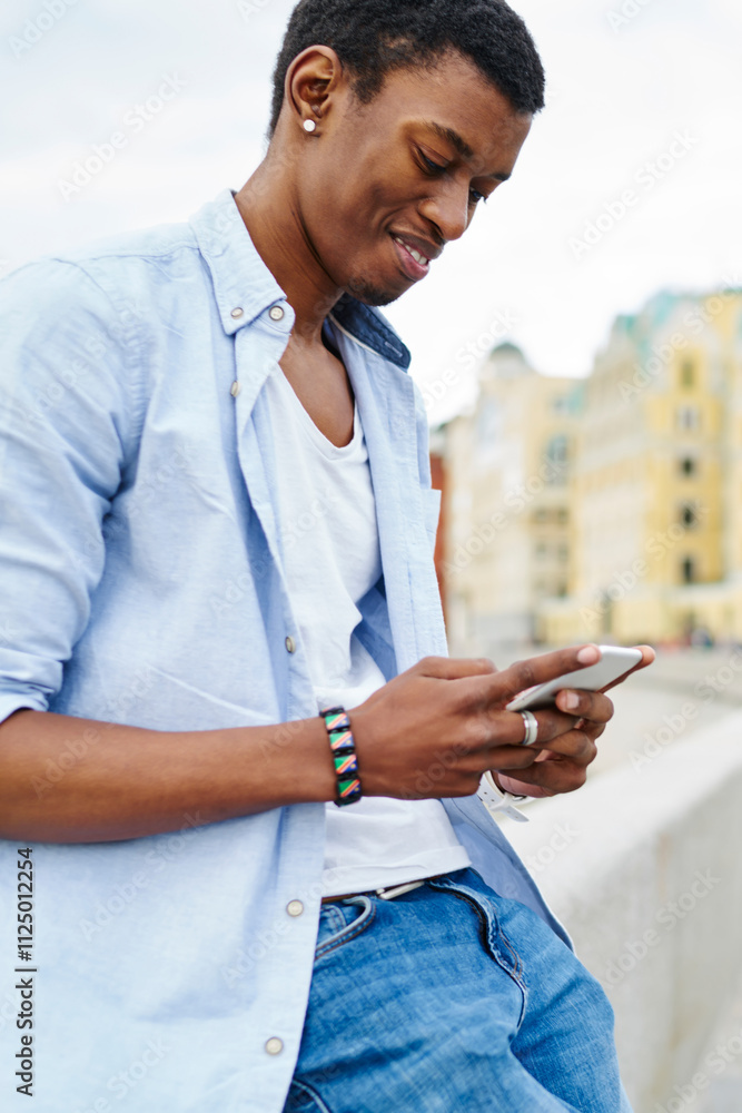 © BullRun - Positive african american hipster blogger chatting online in social networks on modern smartphone using public 4G internet.Cheerful dark skinned tourist messaging on digital cellular © BullRun - Positive african american hipster blogger chatting online in social networks on modern smartphone using public 4G internet.Cheerful dark skinned tourist messaging on digital cellular