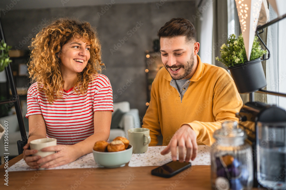 Happy couple have breakfast and cup of coffee at home morning routine Happy couple have breakfast and cup of coffee at home morning routine