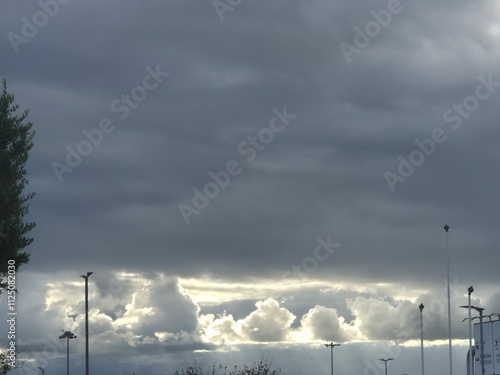 White cumulus clouds in the stormy sky