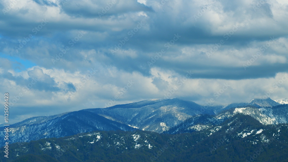 The Sun s Rays Showed The Texture Of The Mountains. Trees On Mountain Slope. Timelapse. The Sun s Rays Showed The Texture Of The Mountains. Trees On Mountain Slope. Timelapse.