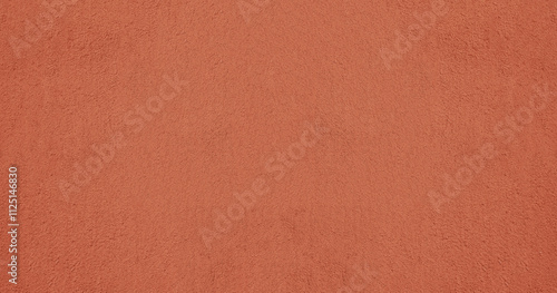 red pink plaster wall texture. Seamless surface abstract solid background Pale painted wall built structure textured stucco in terracotta color. seamless texture of plaster backdrop pattern Peach Fuzz