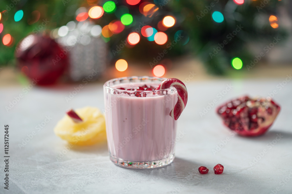 Pineapple pomegranate smoothie in Christmas decor Pineapple pomegranate smoothie in Christmas decor