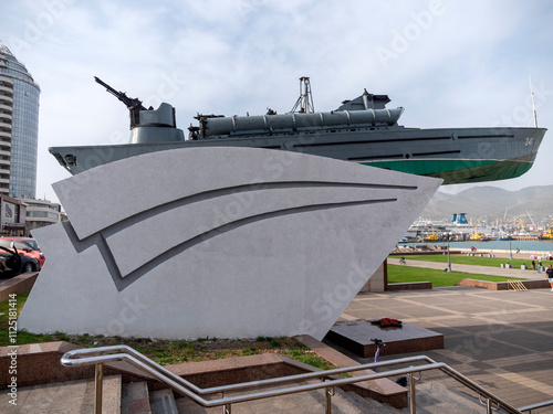 Novorossiysk, Russia 28 August 2024 Novorossiysk Monument torpedo boat inscription to the heroes of the sailors of the Black Sea coast on the embankment in the city near the port photo