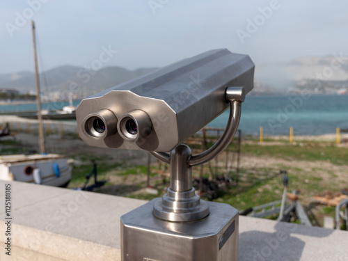 Paid binocular telescope on the tip of the at Black Sea coast in Russia Novorossiysk City photo