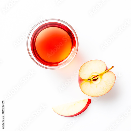 Slice of red apple and glass of apple juice isolated on white background photo