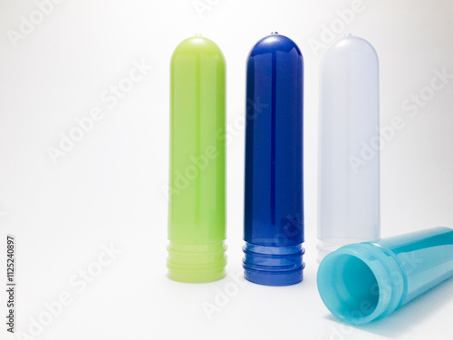 Polypropylene preform isolated on a white background, is plastic that is the result of injection before the blow molding process in making PP bottles photo