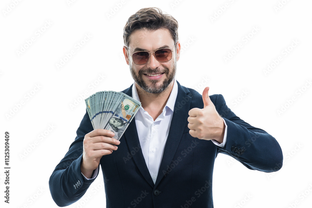 Man with money cash. Dollar banknotes. Portrait of businessman holding money banknotes. Dollar bills, credit, online banking. Rich man pointing at dollar banknotes, bank loan, financial savings. Man with money cash. Dollar banknotes. Portrait of businessman holding money banknotes. Dollar bills, credit, online banking. Rich man pointing at dollar banknotes, bank loan, financial savings.