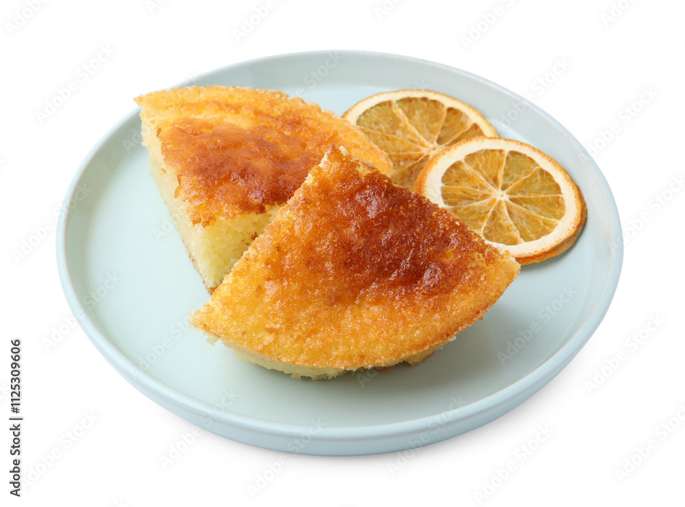 Tasty semolina cake and orange slices isolated on white Tasty semolina cake and orange slices isolated on white