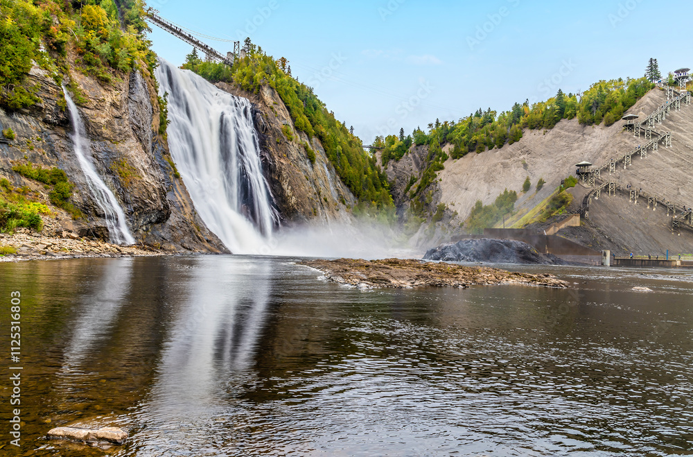 Naklejka premium A view from the bottom of the Montmorency falls near Quebec City, Canada in the fall