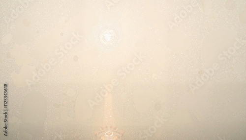 Subtle textured glass with soft golden light glow