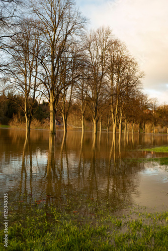 River Severn floods in The Quarry, Shrewsbury, Shropshire, flooding footpaths. Flooding caused by heavy rainfall due to Storm Darragh. photo