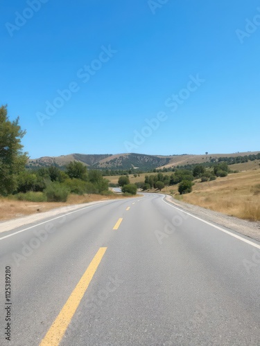 Scenic asphalt road cutting through picturesque countryside under clear blue sky, countryside, blue