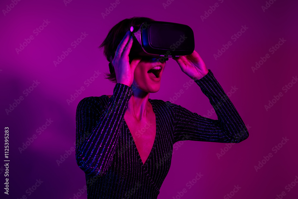 Photo portrait of lovely young lady headset look visual effect dressed stylish overall garment isolated on neon light pink color background Photo portrait of lovely young lady headset look visual effect dressed stylish overall garment isolated on neon light pink color background