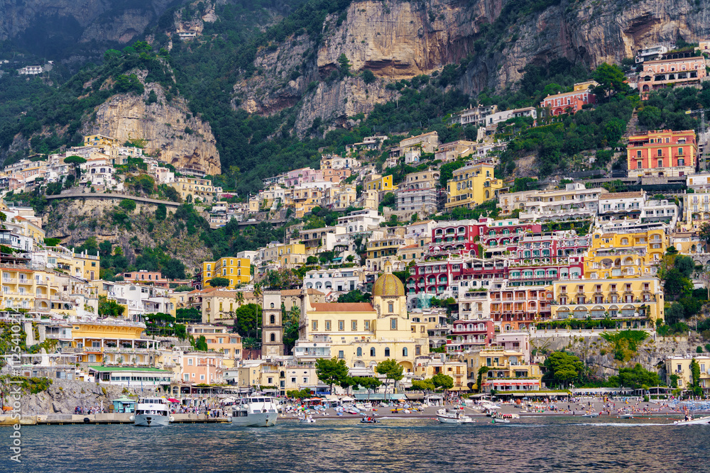 Naklejka premium A view from the sea of ​​a small, colorful town