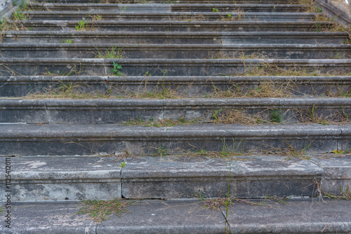 Very old, damaged, stone stairs photo