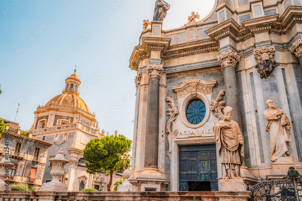 Fototapeta premium View of Cathedral Sant Agata on Piazza del Duomo with Elephant Fountain. in Catania, Sicily, Italy.