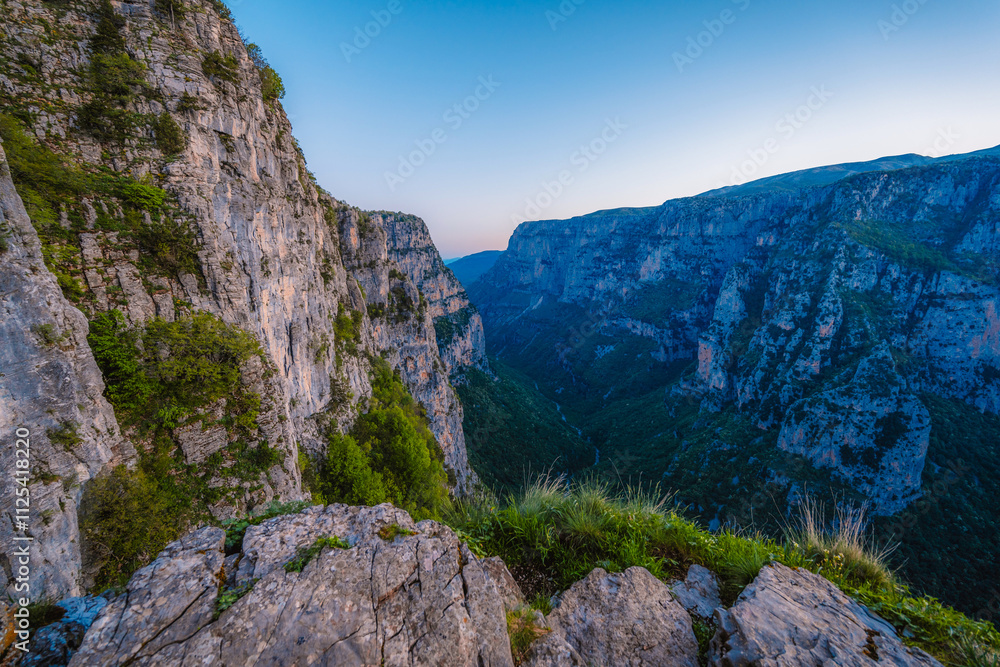 Vikos Gorge from the Oxya Viewpoint in the national park in Vikos-Aoos in zagori, northern Greece. Nature landscape Vikos Gorge from the Oxya Viewpoint in the national park in Vikos-Aoos in zagori, northern Greece. Nature landscape