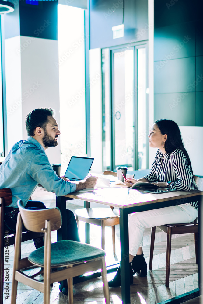Business people negotiating in meeting room Business people negotiating in meeting room
