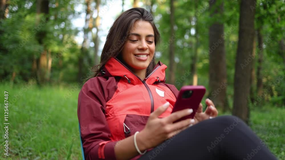 Young woman surfing the net and relaxing in the nature Young woman surfing the net and relaxing in the nature