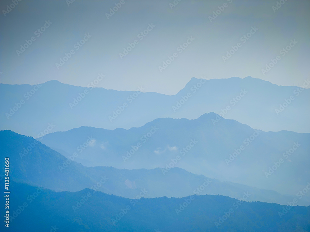 Obraz premium Vietnamese landscape with mountain scenery and shadows. Layers of mountains. Da Nang province, Vietnam. Aerial drone view