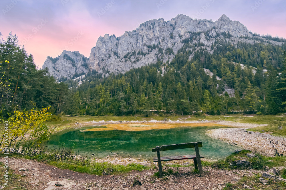 Grüner See at sunset, lake in Styria, Austria village Tragöß. Hochschwab Mountains and forests. Landscape and nature background