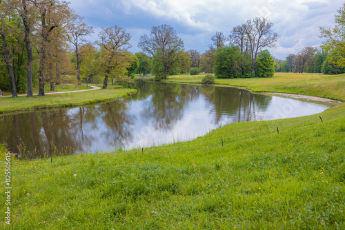 Serene Pond in Lush Spring Landscape