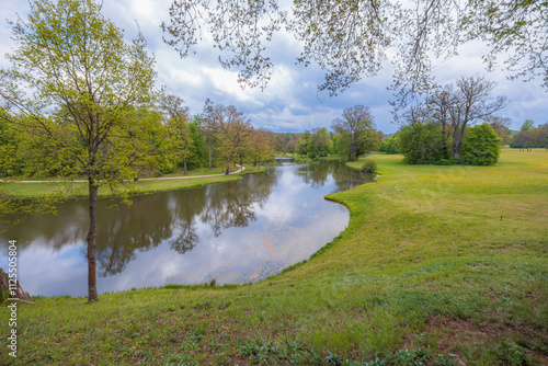 Serene Pond in Lush Spring Landscape
