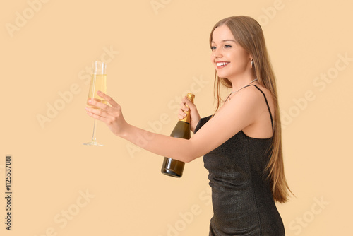 Young woman with champagne ...