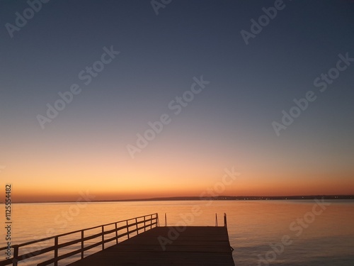 sunset at the pier in summer