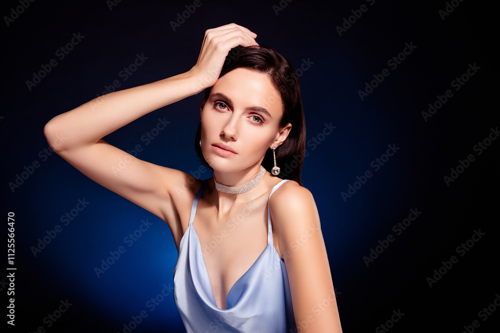 Fototapeta premium Photo of classy girl look touch wear bkue dress isolated dark color background