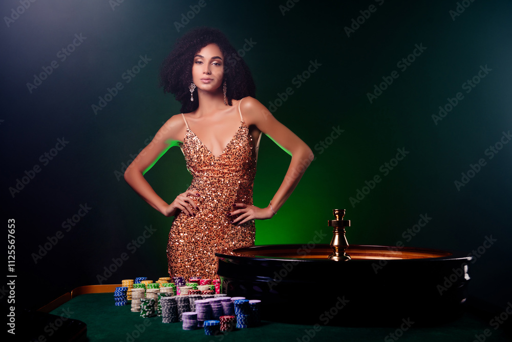 Photo of gorgeous lucky rich girl dealer playing casino turning wheel for luck private vip club with neon filter Photo of gorgeous lucky rich girl dealer playing casino turning wheel for luck private vip club with neon filter