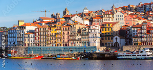 Colourful facades of historic buildings in the Ribeira district of Porto, Portugal photo