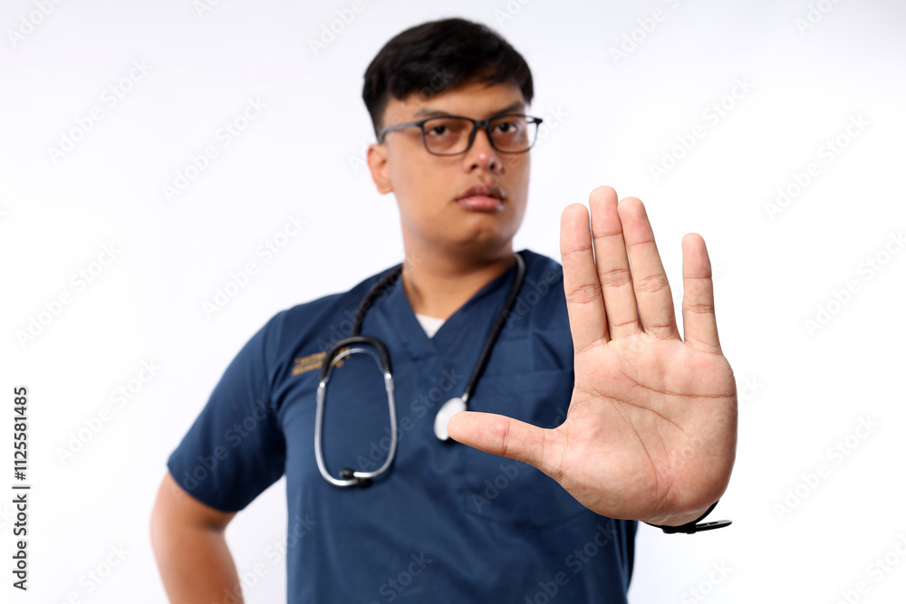 Healthcare workers concept. Serious-looking displeased asian doctor, nurse in scrubs stopping you, show prohibit, warning gesture, forbid patient Healthcare workers concept. Serious-looking displeased asian doctor, nurse in scrubs stopping you, show prohibit, warning gesture, forbid patient