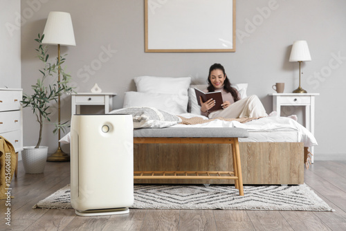 Air purifier against woman ...