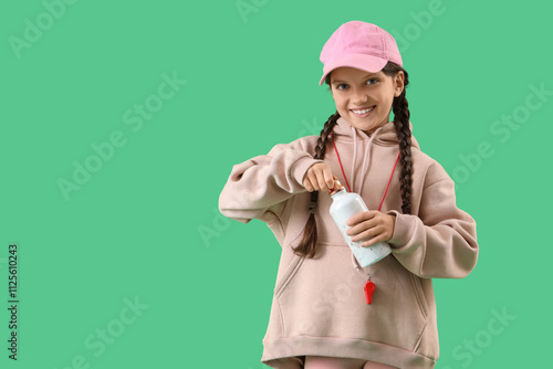 Cute trainer with bottle of...