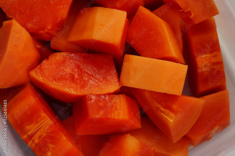 Papaya cut into pieces, ready to eat Papaya cut into pieces, ready to eat