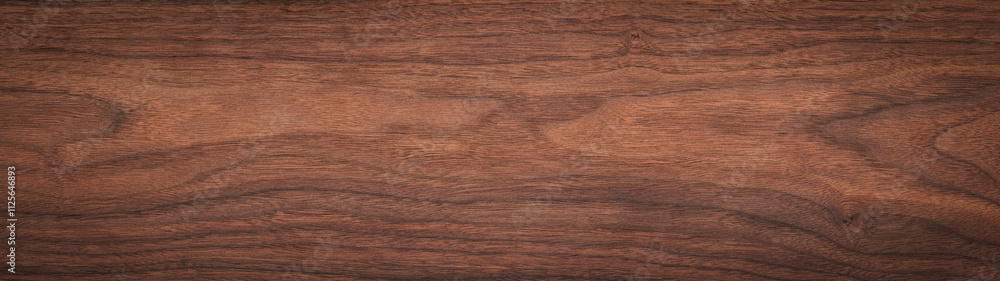 Walnut plank top. Long plank texture background. Panoramic wood plank texture background. Walnut wood plank natural texture. Panoramic background elements. Walnut plank top. Long plank texture background. Panoramic wood plank texture background. Walnut wood plank natural texture. Panoramic background elements.