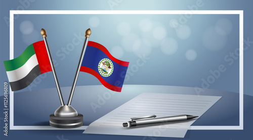 United Arab Emirate and Belize National flags on small table with bokeh background, cooperative relationship