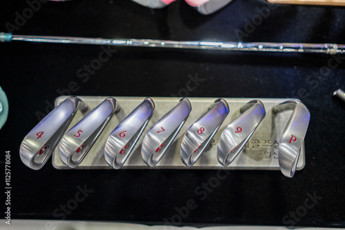 Wallpaper Mural A brand new set of golf club irons top view Torontodigital.ca