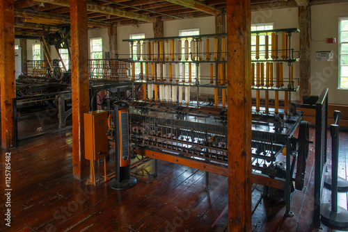 Schilderij op canvas Loom in Wilkinson Mill building in Old Slater Mill National Historic Landmark on Roosevelt Avenue in downtown Pawtucket, Rhode Island RI, USA